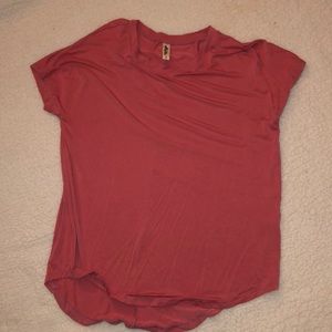 Size S. Pink Herou brand top. Excellent condition